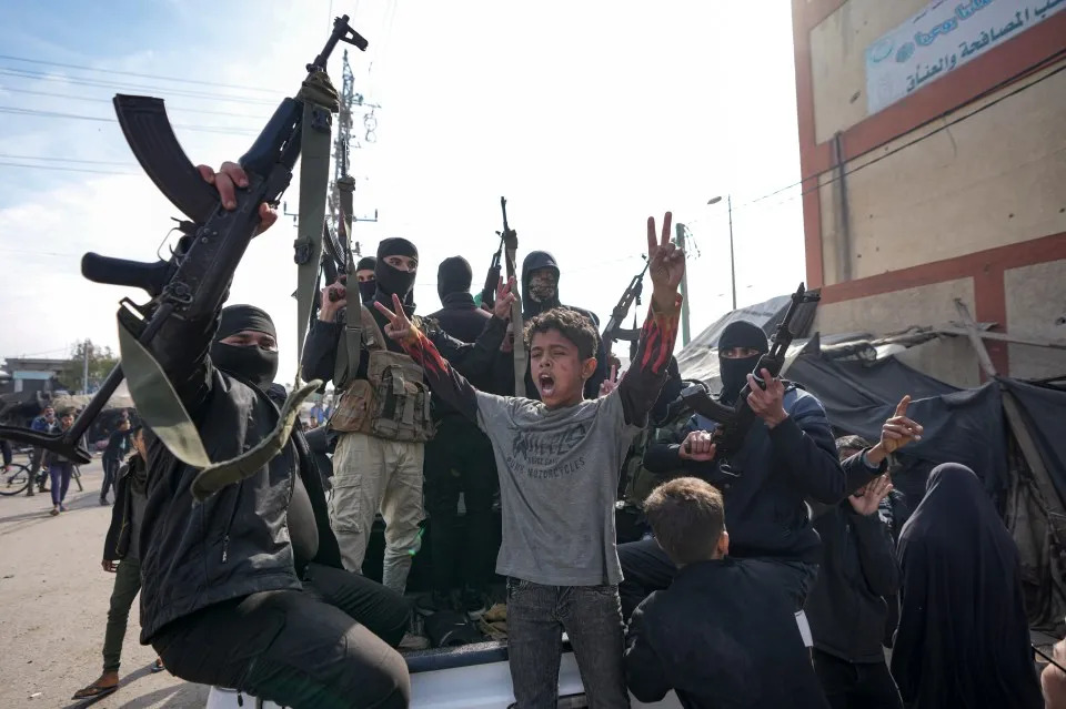 On January 19th, heavily armed Hamas members celebrated the ceasefire in front of the crowd. On January 19th, heavily armed Hamas members celebrated the ceasefire in front of the crowd.